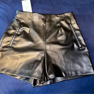 Zara’s FAUX LEATHER SHORTS WITH A HIGH WAIST